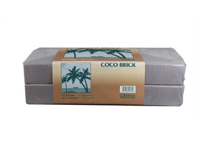 Canna Coco Brick 40L (2 pack, 40L total). This product comes in two rectangular brick packs wrapped in a brown label with green accents and a row of green palm trees. The product is shot on a side view. This Canna Coco Professional Plus Cube is the exact same high quality as the much desired loose fill Canna Coco. 