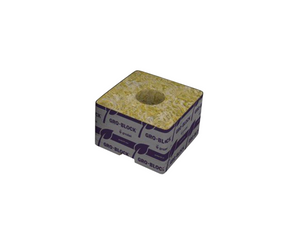 Grodan Delta 6.5 cube (4 x 4 x 2.5) is wrapped in a silver and purple wrapper with purple leaves. The product is greenish in colour with a hole in the centre. 