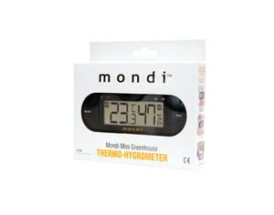 Mondi Mini Greenhouse Thermo-Hygrometer reads temperature and humidity inside the dome. This product is shown facing slightly to the left (front view), in package (white), with circular clear face showing the black face of the thermo-hygrometer with digital face. 