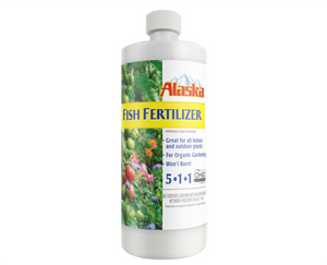 Alaska Fish Fertilizer (5-1-1) is a 100% organic fish-based nutrient for indoor and outdoor plants. This product comes in a white cylindrical bottle, tapered at the top. On the left side of the label there’s a photograph of various colours of tomatoes (green, red). On the right, the label is white with text. 