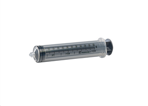 60ml Syringe. Measures up to 60 cc/mL with 1cc increments. This syringe is shown on its side in the centre of the frame, clear exterior (barrel) with silver plunger & black plunger grip
