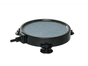 8” Round black disc framing a large blue circular aeration stone . Three suction cup’s along the bottom edge of the frame to hold the disc in place when submerged under water. 
