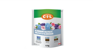 C-I-L Aluminum Sulphate comes in a white rectangular resealable bag with a bright green square on the top of the bag overlapped by an elliptical orange shape in the centre with white block letters displaying “C-I-L”. Below the logo, there is an arrangement of blue and purple hydrangeas with soft and vibrant roses. Aluminum Sulphate is written in block letters over a light blue horizontal rectangular black. Underneath are three squares with illustrations of product use. 