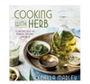 Cooking with Herb: 75 Recipes for the Marley Natural Lifestyle, is a lifestyle book reflecting the Marley Natural brand’s holistic clean living philosophy. Wellness guru Cedella Marley, the daughter of famed reggae legend Bob Marley. This is a product shot of the cover of the book, a bronze try with cannabis infused oils, hemp hearts, pesto and seeds. 