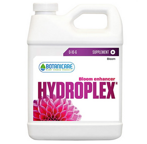 Botanicare Hydroplex (0-10-6) is a bloom enhancer formulated to enhance fruit, flower and bud development in the blooming phase of a plant's life cycle. This product comes in a white jug-like container with a white label and a photo of a pink flower in the bottom left corner. 